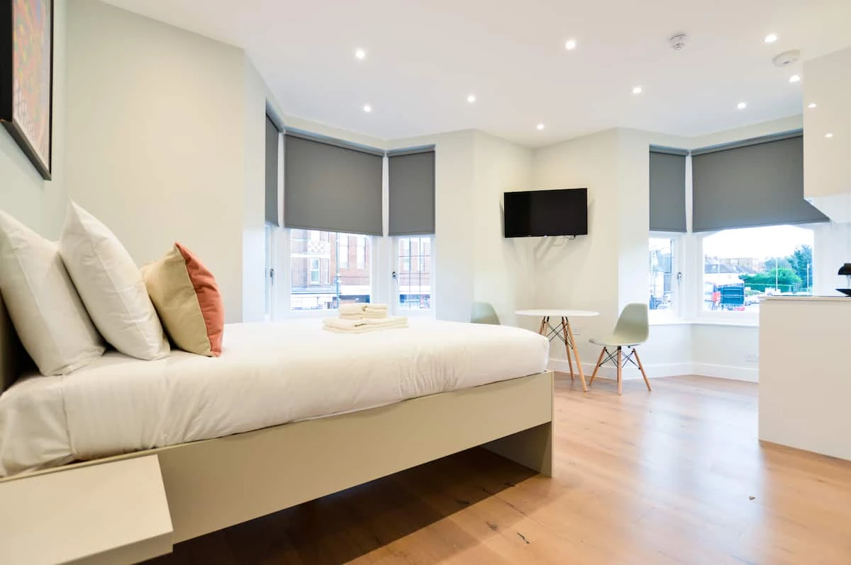Golders Green serviced apartment with a sage kitchen and living space